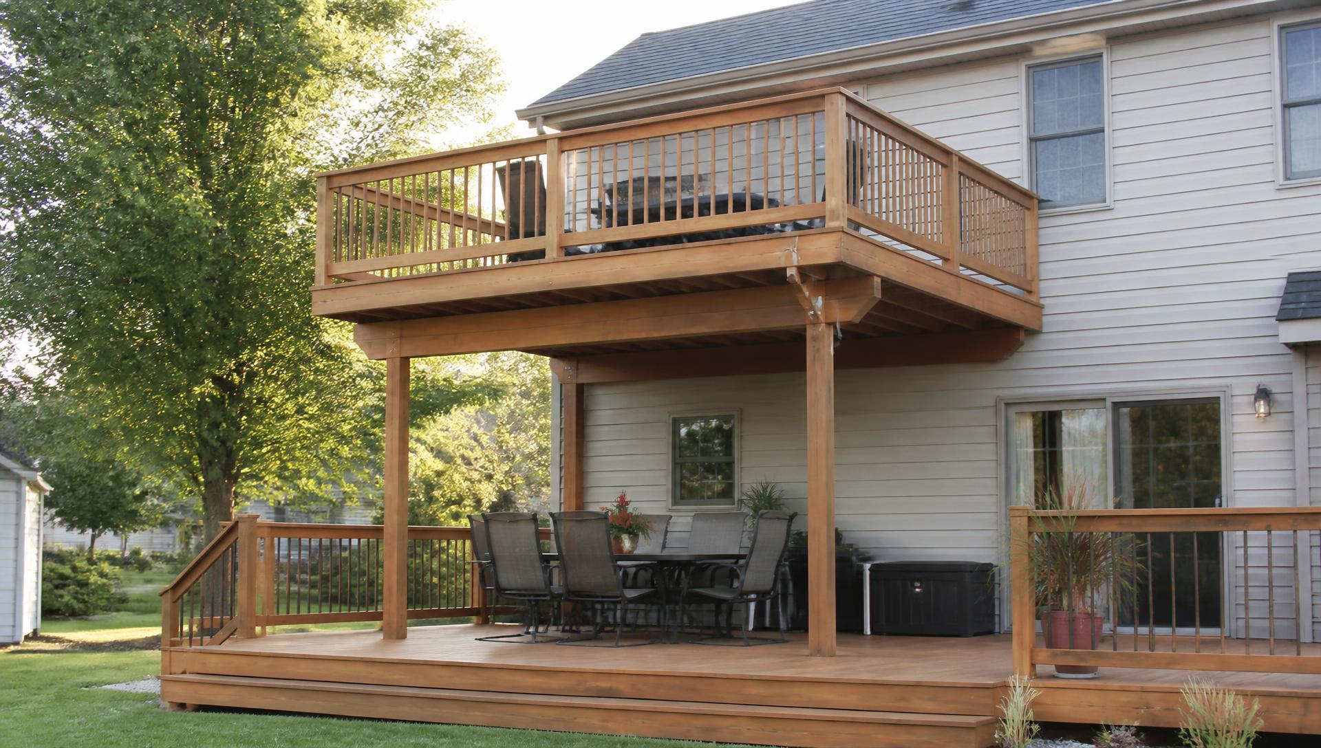 Backyard cedar deck with outdoor dining space on a Midwest home
