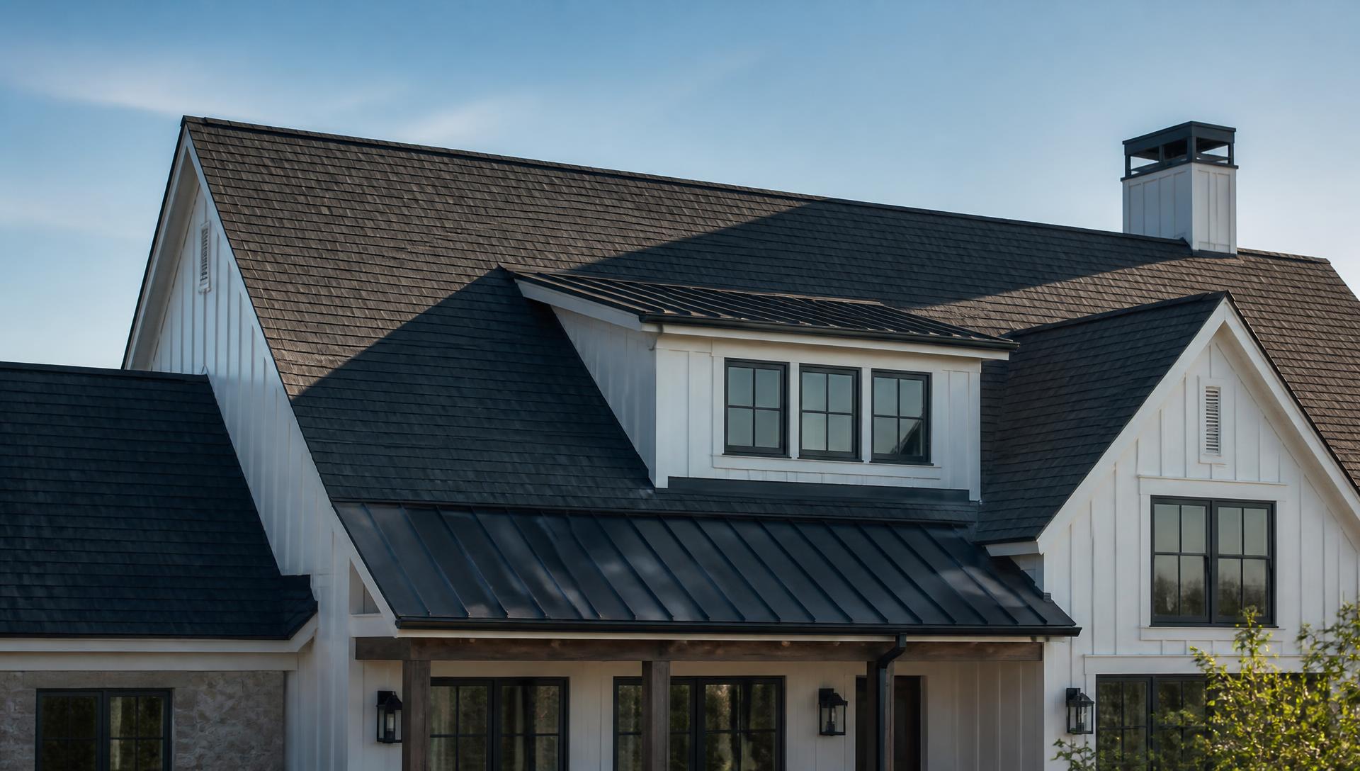 Completed residential roofing project on a modern farmhouse